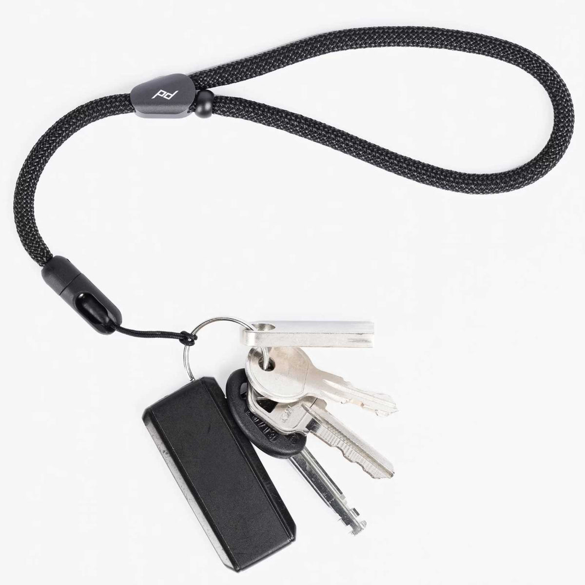 Peak Design Mobile Cuff – Handschlaufe mit Micro-Anchor-System – Größenvergleich in der Hand