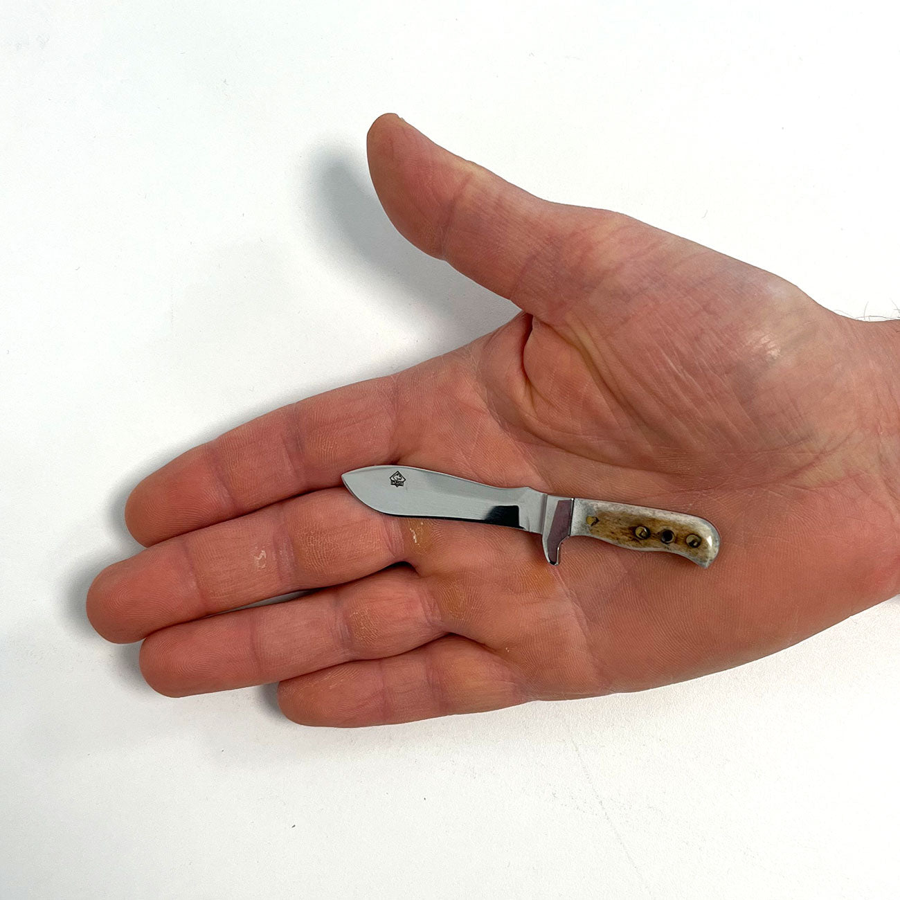 Puma Mini White Hunter – Miniatur Sammlermesser mit Hirschhorn & Lederscheide